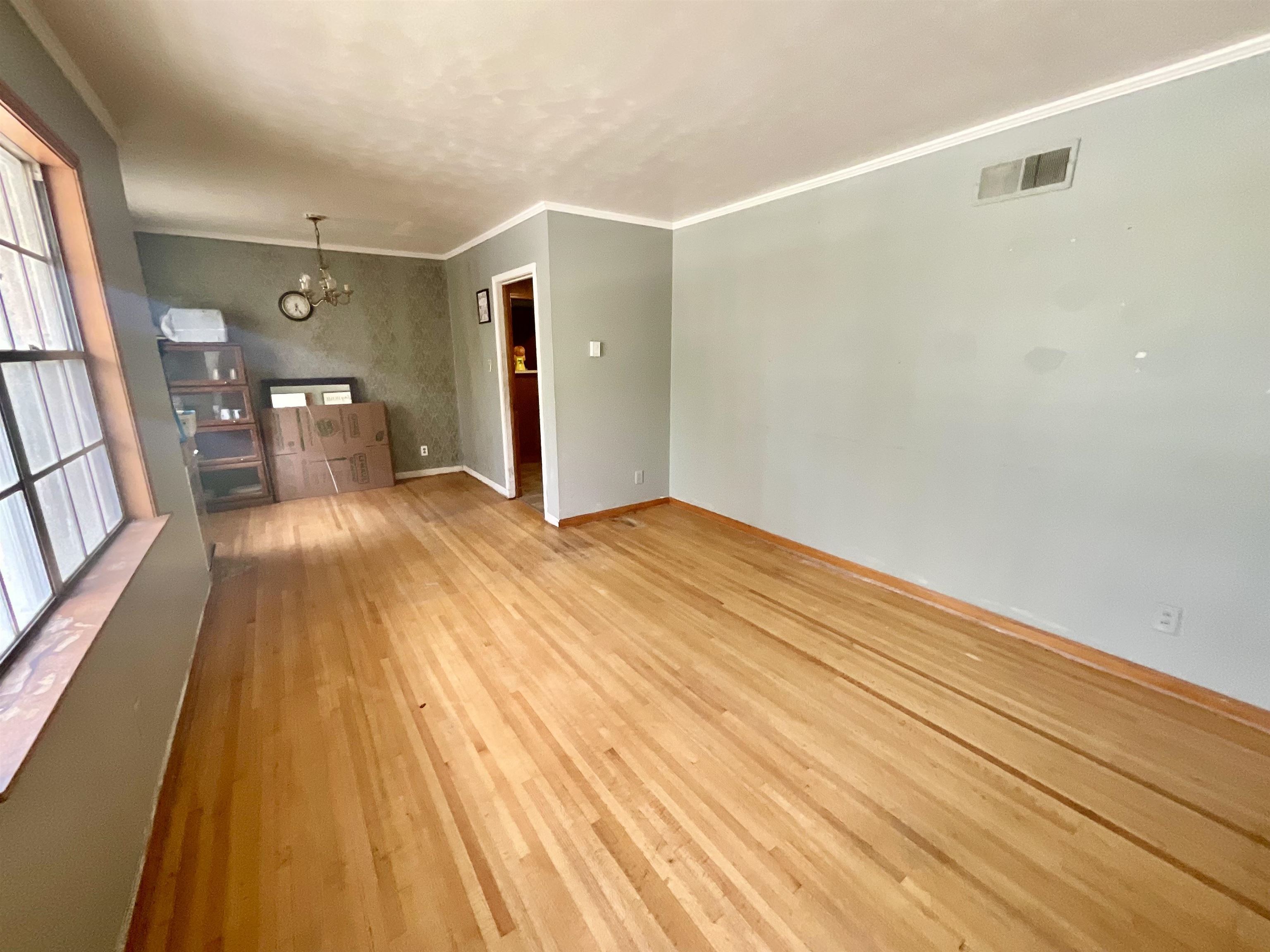 3370 Debby Street Memphis, TN 38127 - Photo 5 of 8 a view of a room with wooden floor