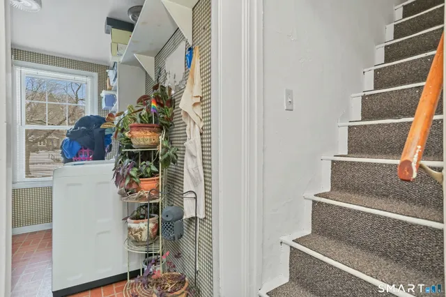 a room with a table and chairs