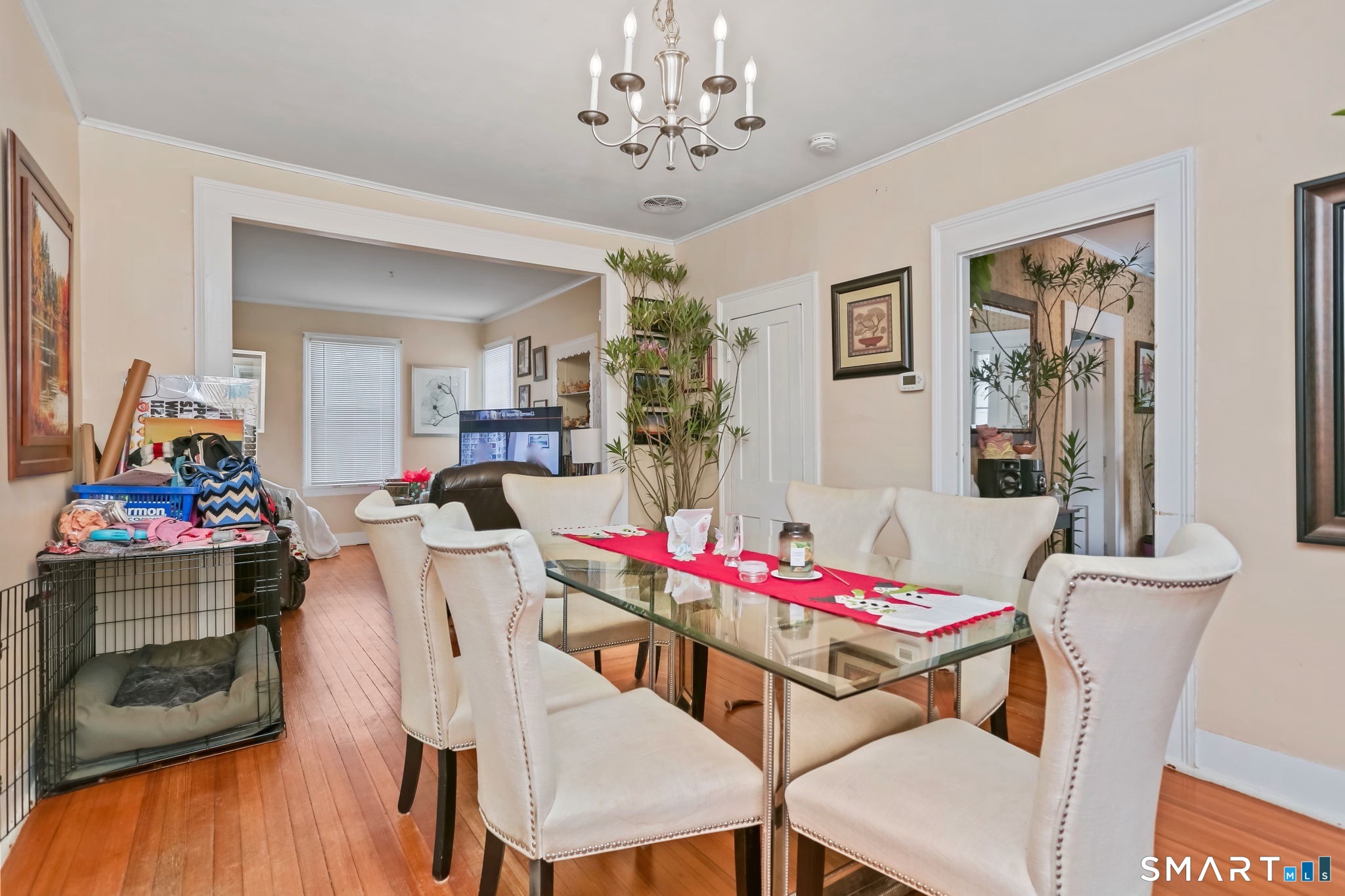 877 White Plains Road Trumbull, CT 06611 - Photo 16 of 33 a view of a dining room with furniture and wooden floor