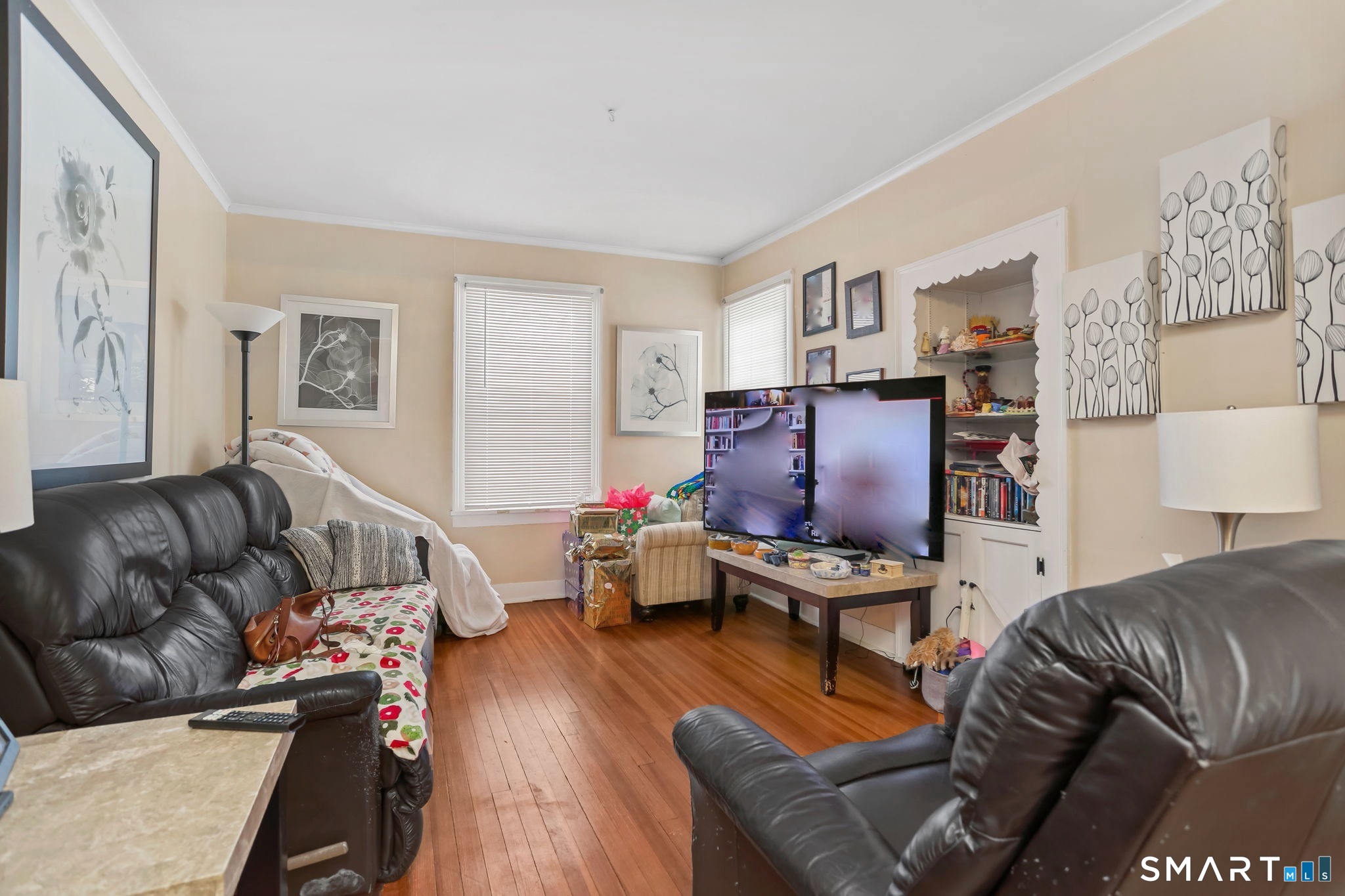 877 White Plains Road Trumbull, CT 06611 - Photo 17 of 33 a living room with furniture and wooden floor