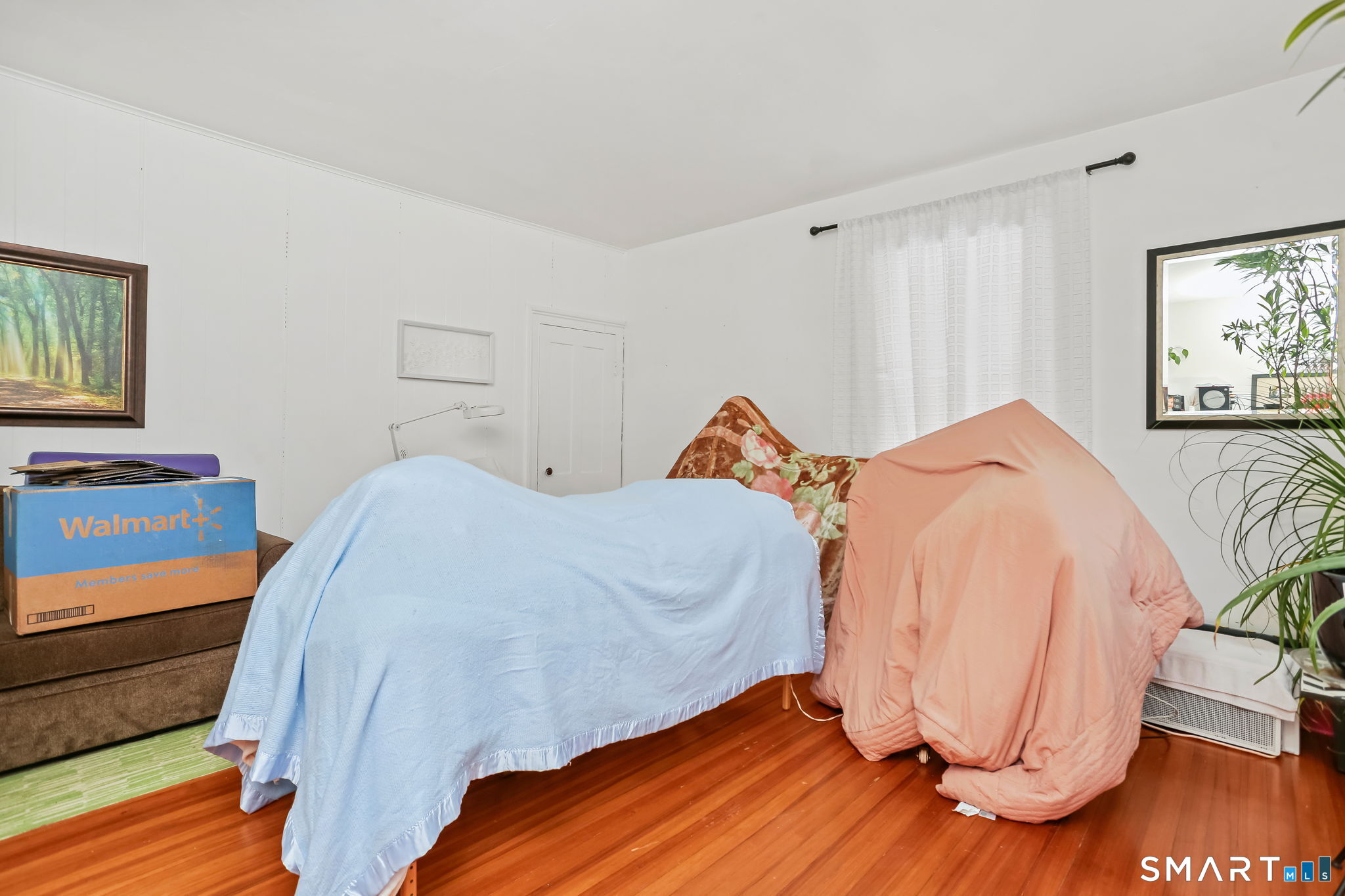 877 White Plains Road Trumbull, CT 06611 - Photo 20 of 33 a bed room with a bed and a chair