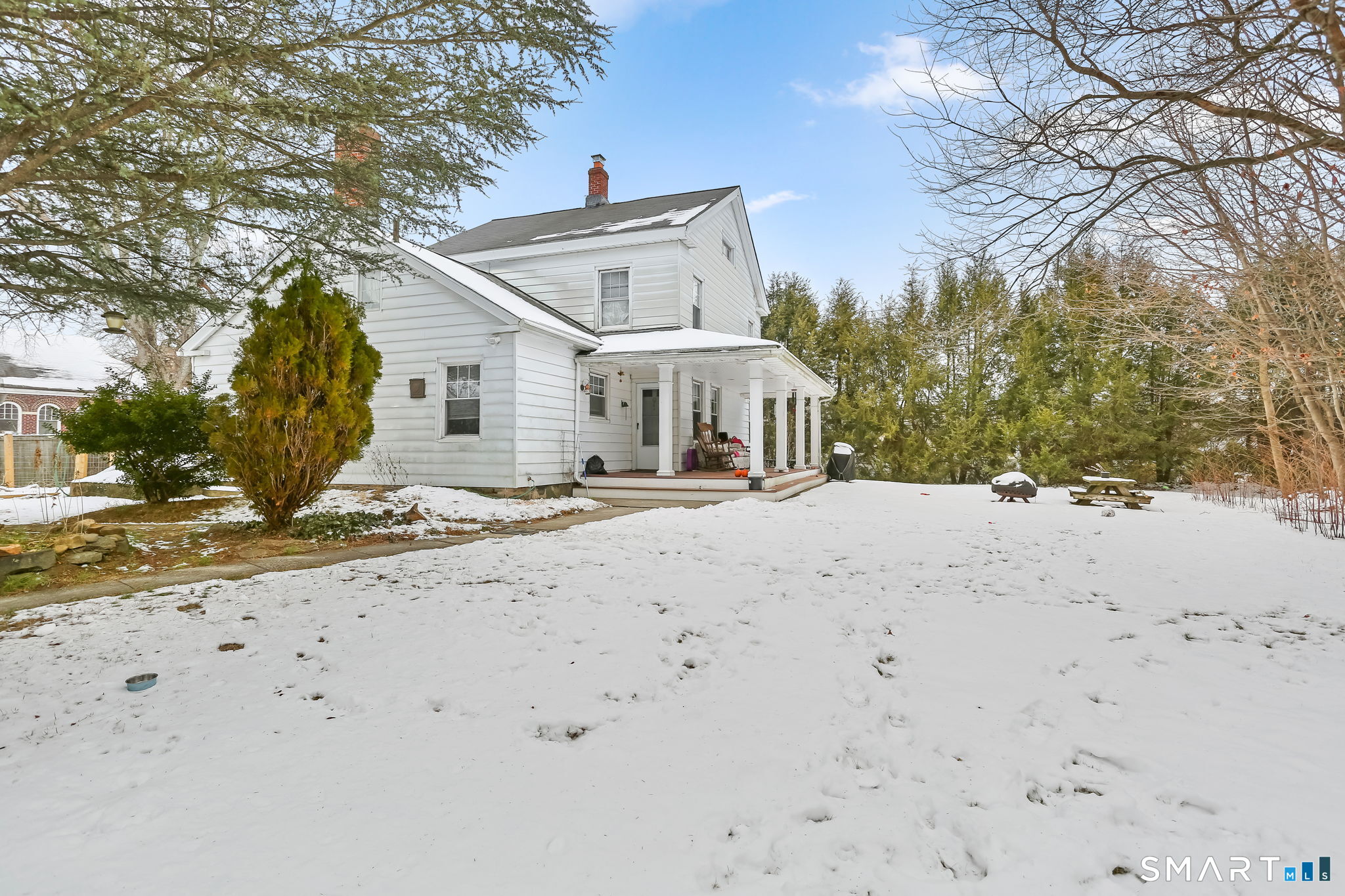 877 White Plains Road Trumbull, CT 06611 - Photo 4 of 33 a view of road with large trees