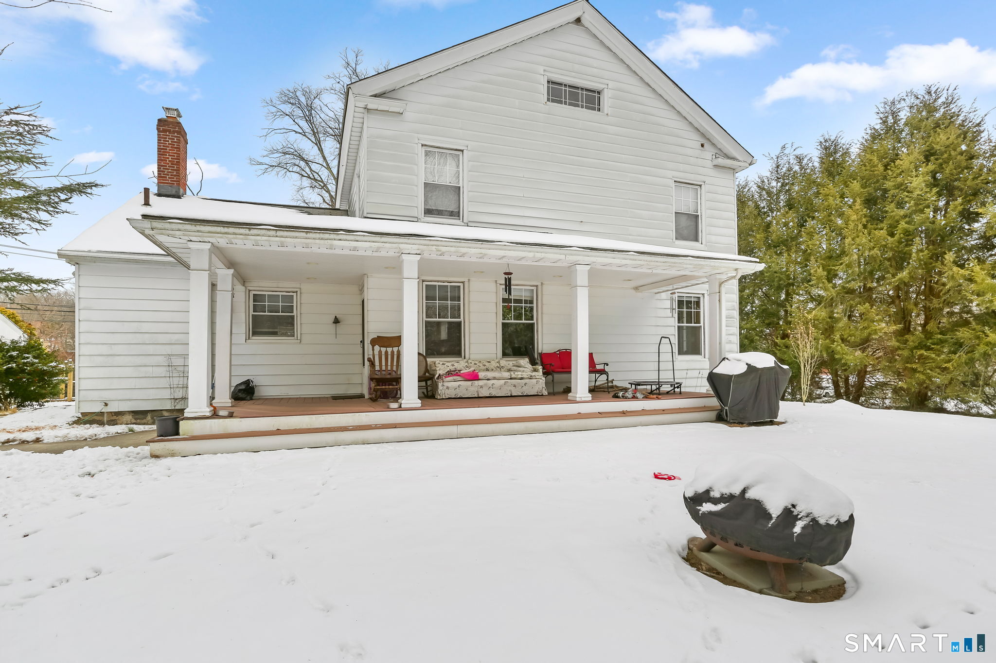 877 White Plains Road Trumbull, CT 06611 - Photo 6 of 33 a front view of a house with a yard