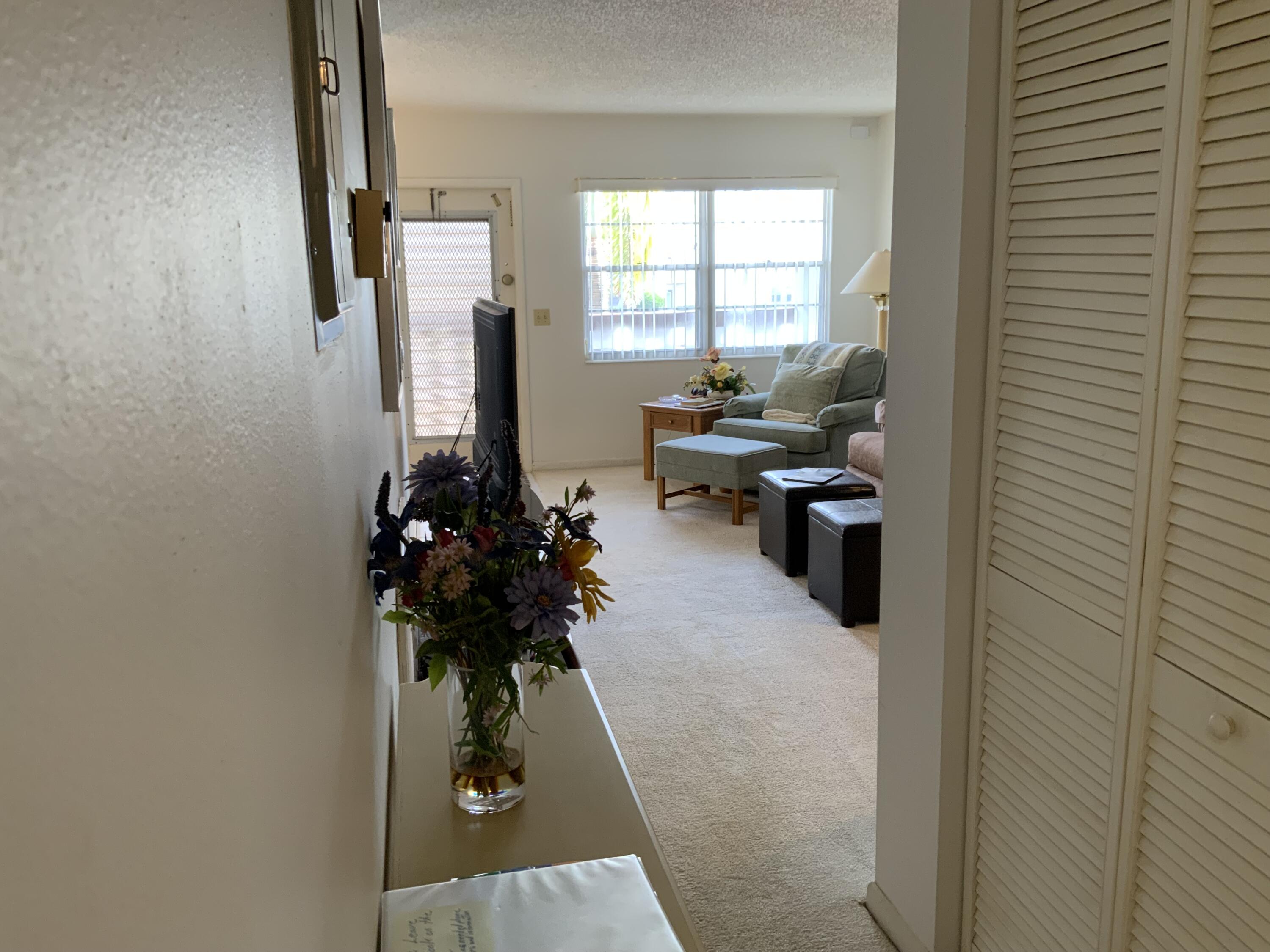 2050 Hythe A Boca Raton, FL 33434 - Photo 3 of 20 a room with furniture and a window