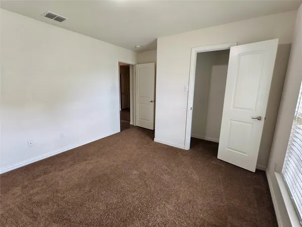 an empty room with closet