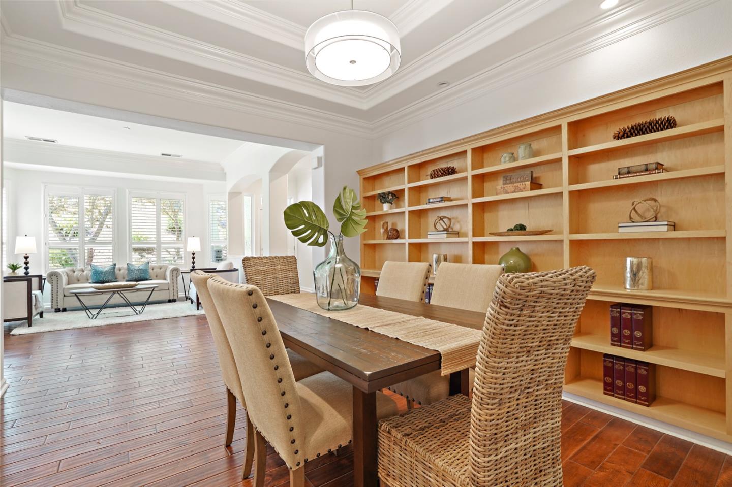 3066 Grey Eagle Drive Walnut Creek, CA 94595 - Photo 13 of 47 a view of a dining room with furniture and wooden floor