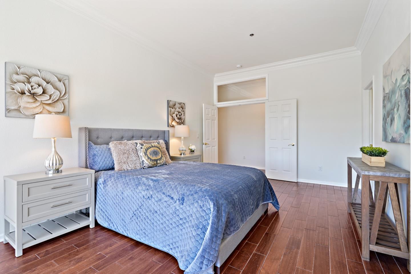 3066 Grey Eagle Drive Walnut Creek, CA 94595 - Photo 19 of 47 a bedroom with a bed and wooden floor