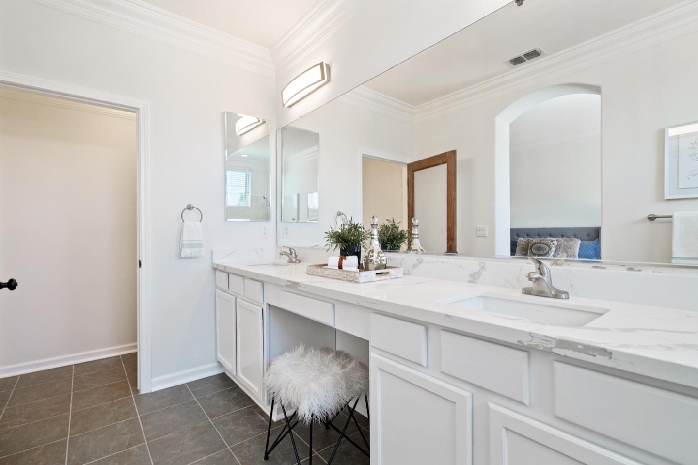 3066 Grey Eagle Drive Walnut Creek, CA 94595 - Photo 25 of 47 a bathroom with a sink vanity and a mirror