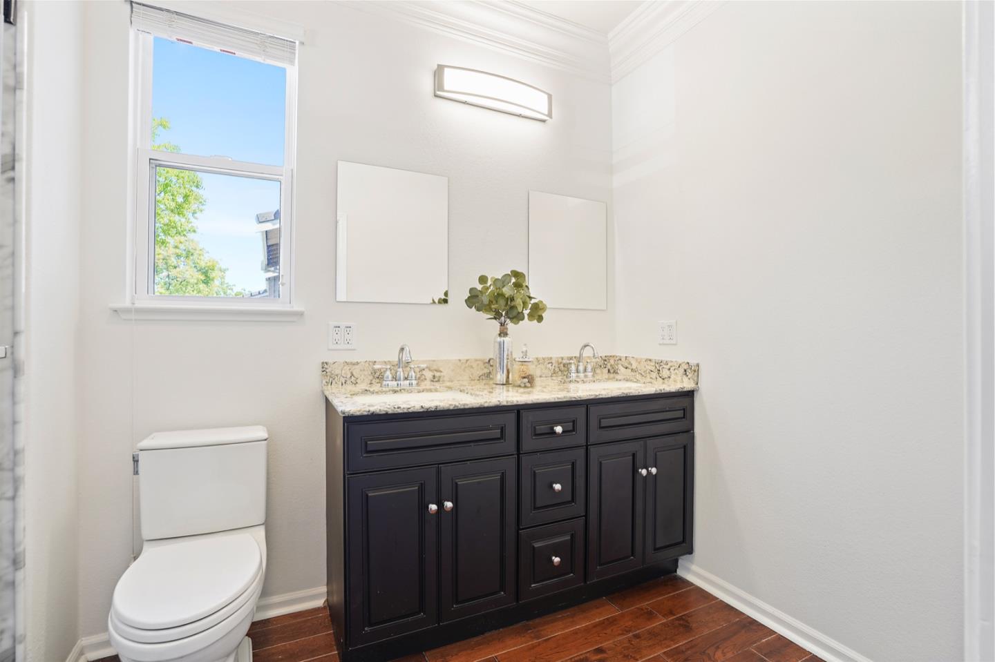 3066 Grey Eagle Drive Walnut Creek, CA 94595 - Photo 28 of 47 a bathroom with a toilet a sink and mirror
