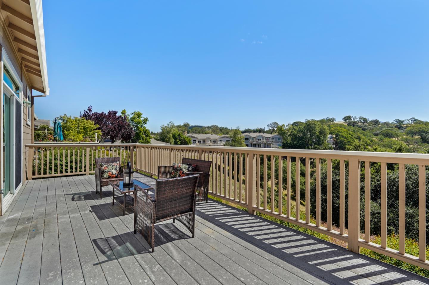 3066 Grey Eagle Drive Walnut Creek, CA 94595 - Photo 34 of 47 a view of a balcony with wooden floor and outdoor seating