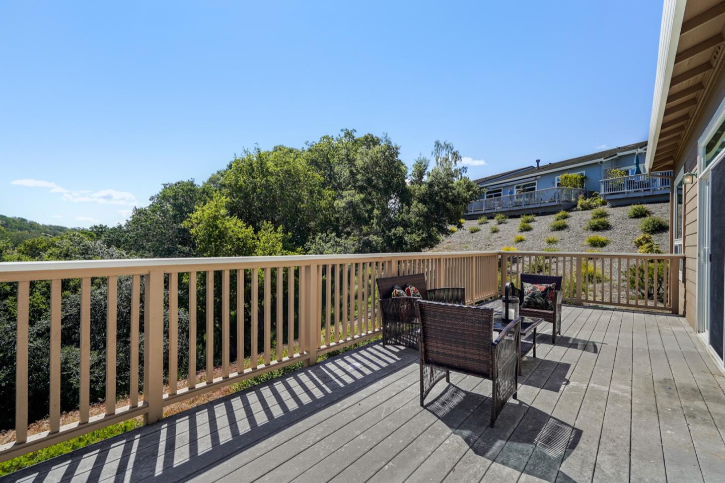 3066 Grey Eagle Drive Walnut Creek, CA 94595 - Photo 35 of 47 a view of a chair and table on the wooden floor