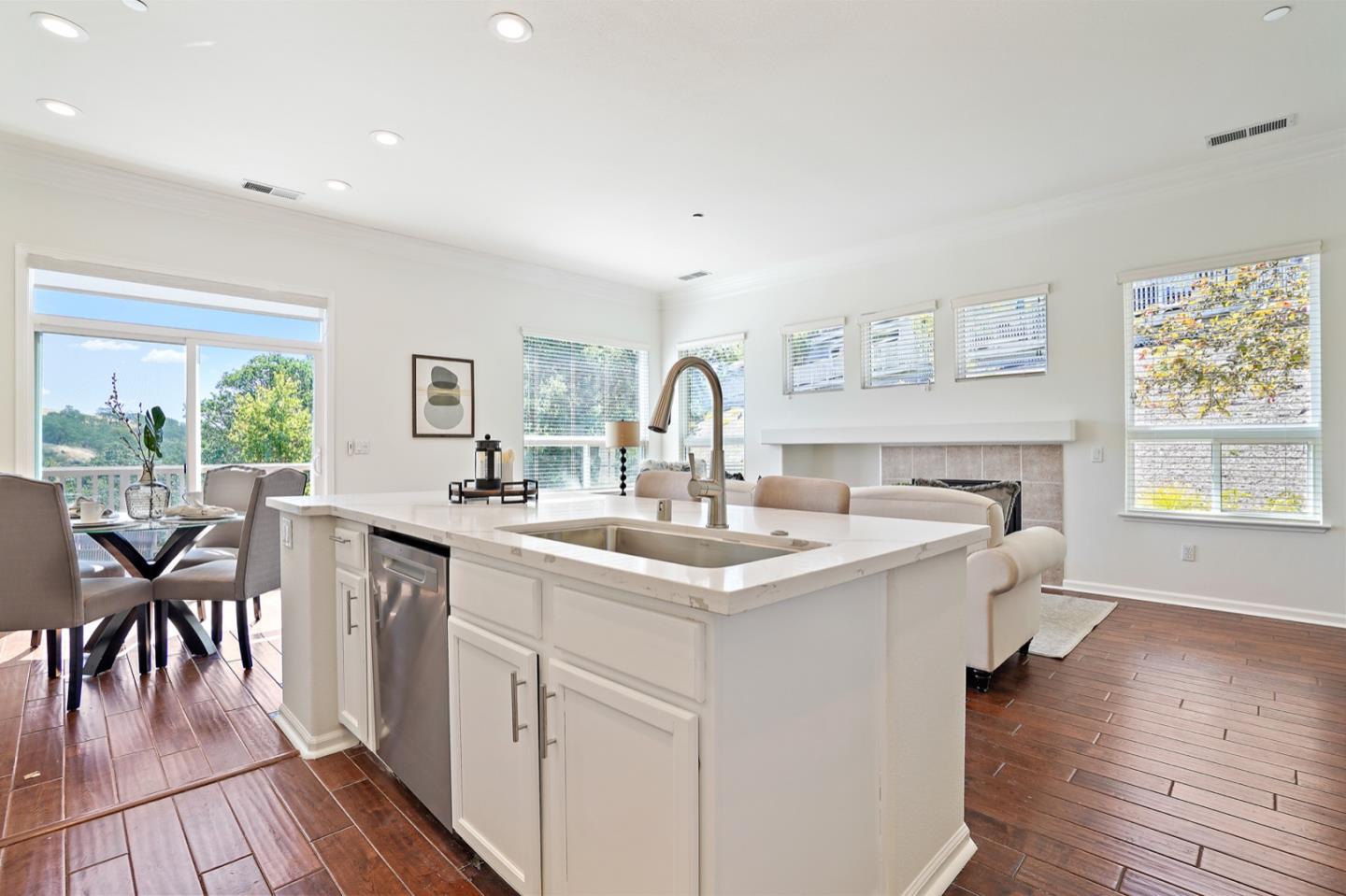 3066 Grey Eagle Drive Walnut Creek, CA 94595 - Photo 5 of 47 a kitchen with a sink cabinets and dining table