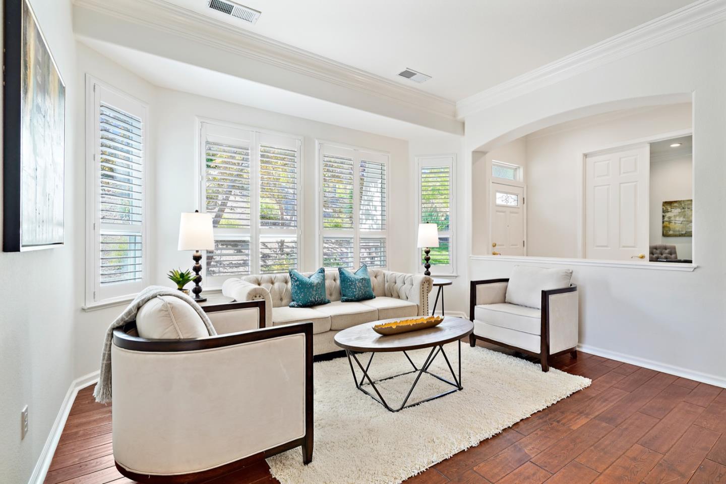 3066 Grey Eagle Drive Walnut Creek, CA 94595 - Photo 10 of 47 a living room with furniture a table and large windows