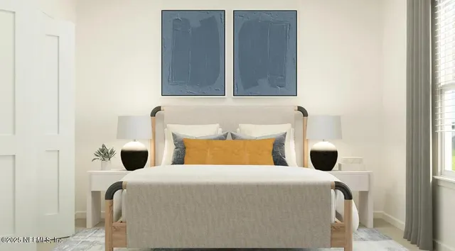 a bedroom with a bed and a window