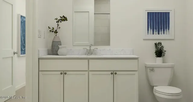 a bathroom with a sink and a toilet