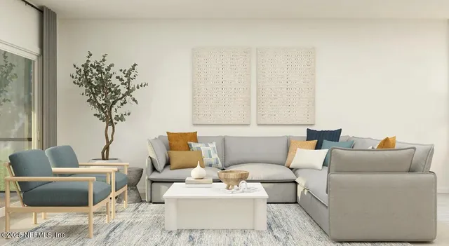 a living room with furniture and a potted plant