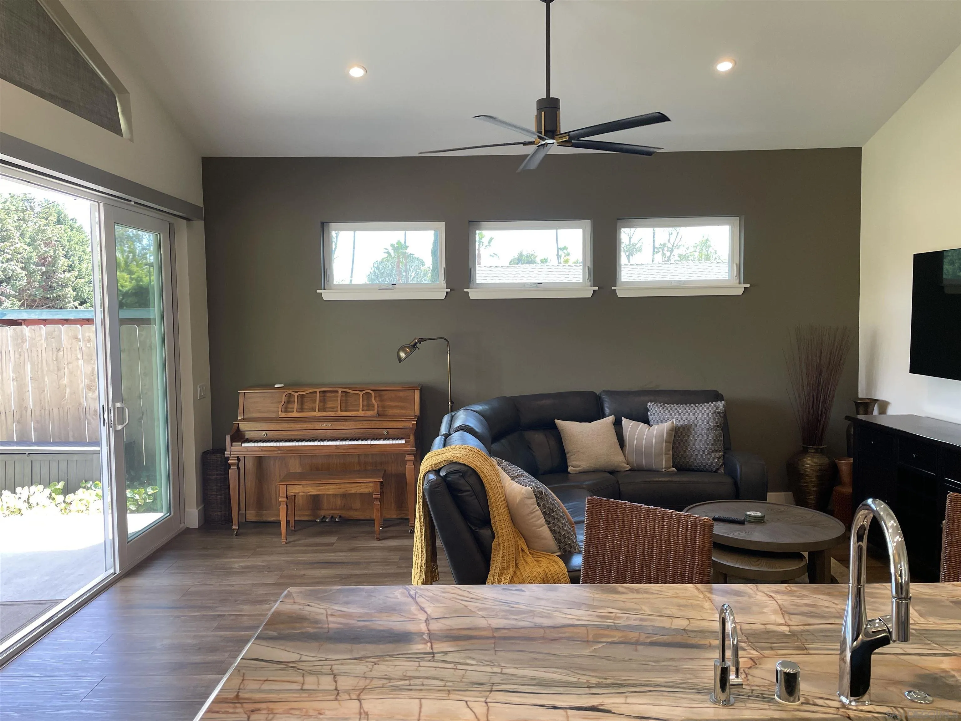 327 Cole Ranch Road Encinitas, CA 92024 - Photo 13 of 22 a living room with furniture and a flat screen tv