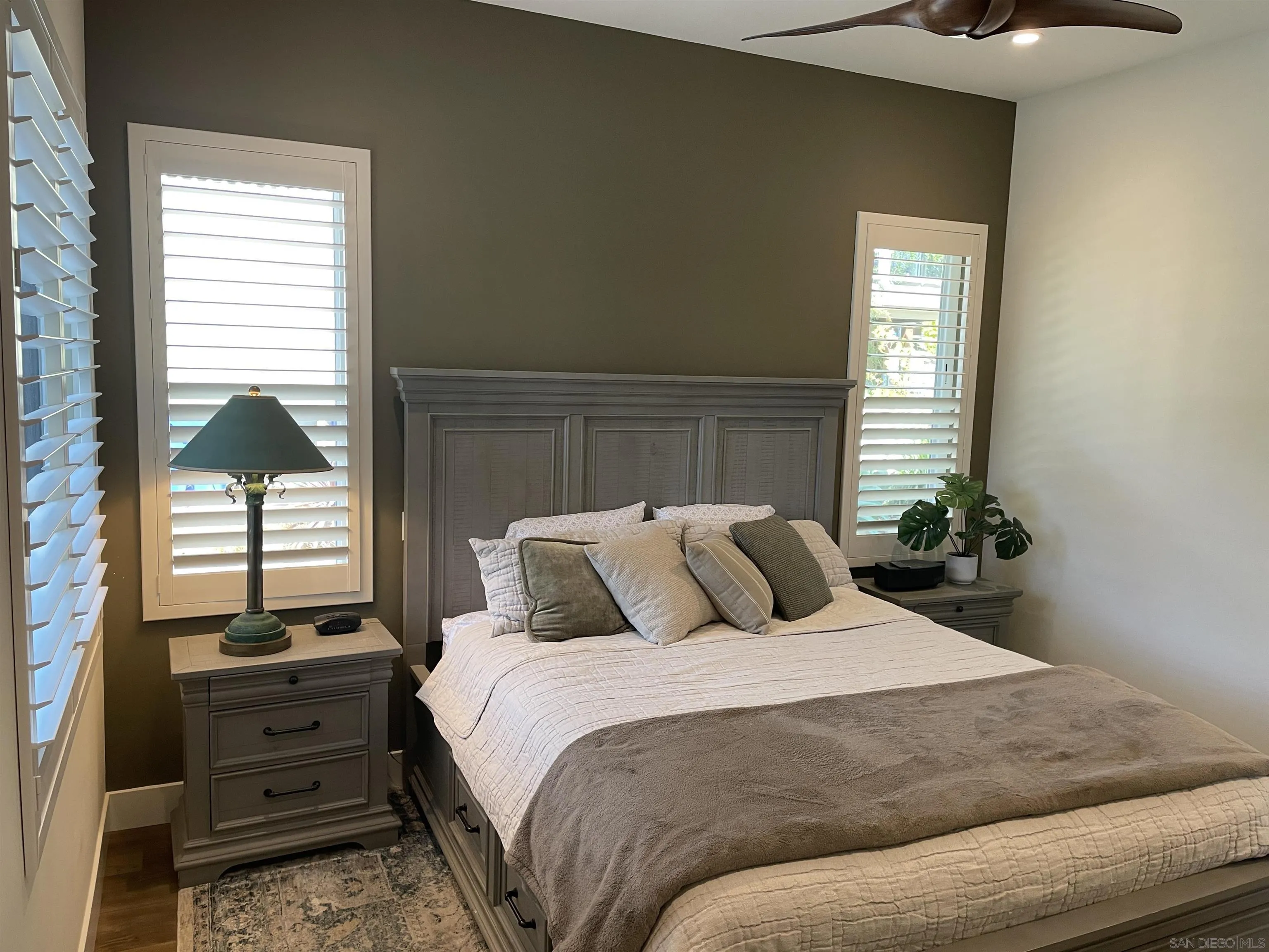 327 Cole Ranch Road Encinitas, CA 92024 - Photo 17 of 22 a bedroom with a bed and a window