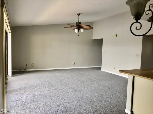 an empty room with fan