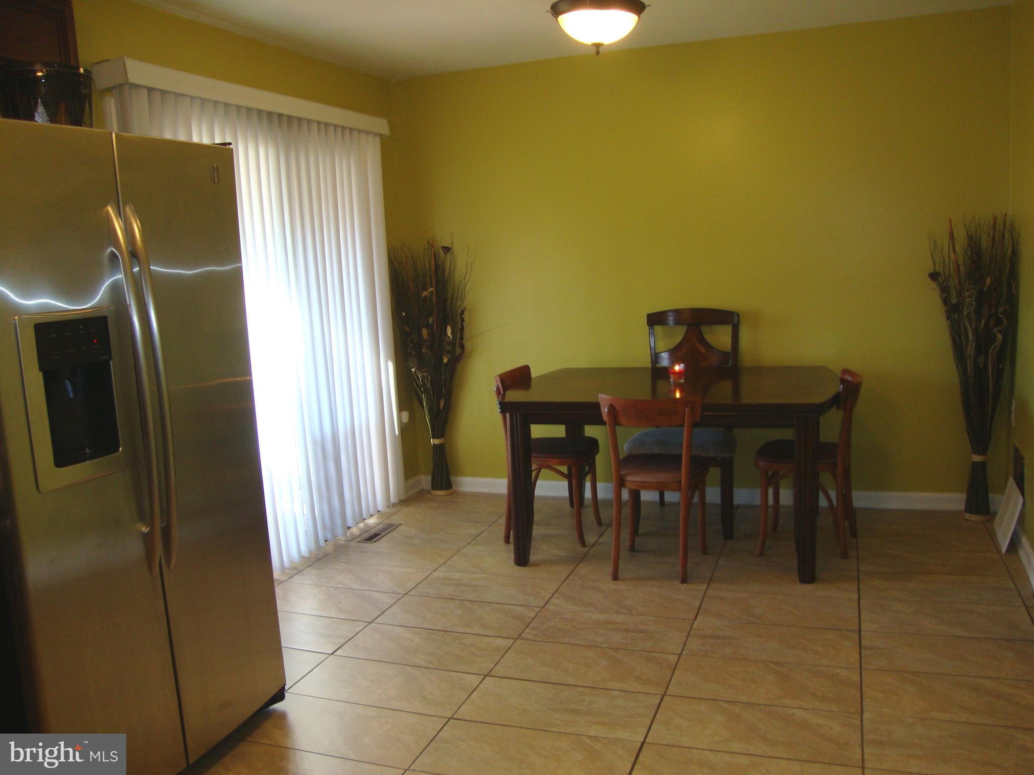 328 Laburnum Road Edgewood, MD 21040 - Photo 36 of 41 Extend your dining to the covered deck