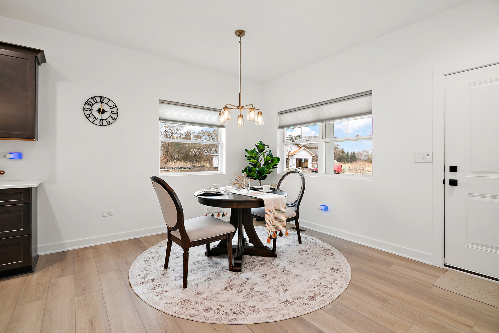 2037 Isabella Lane Minooka, IL 60447 - Photo 2 of 29 a view of a dining room with furniture window and wooden floor