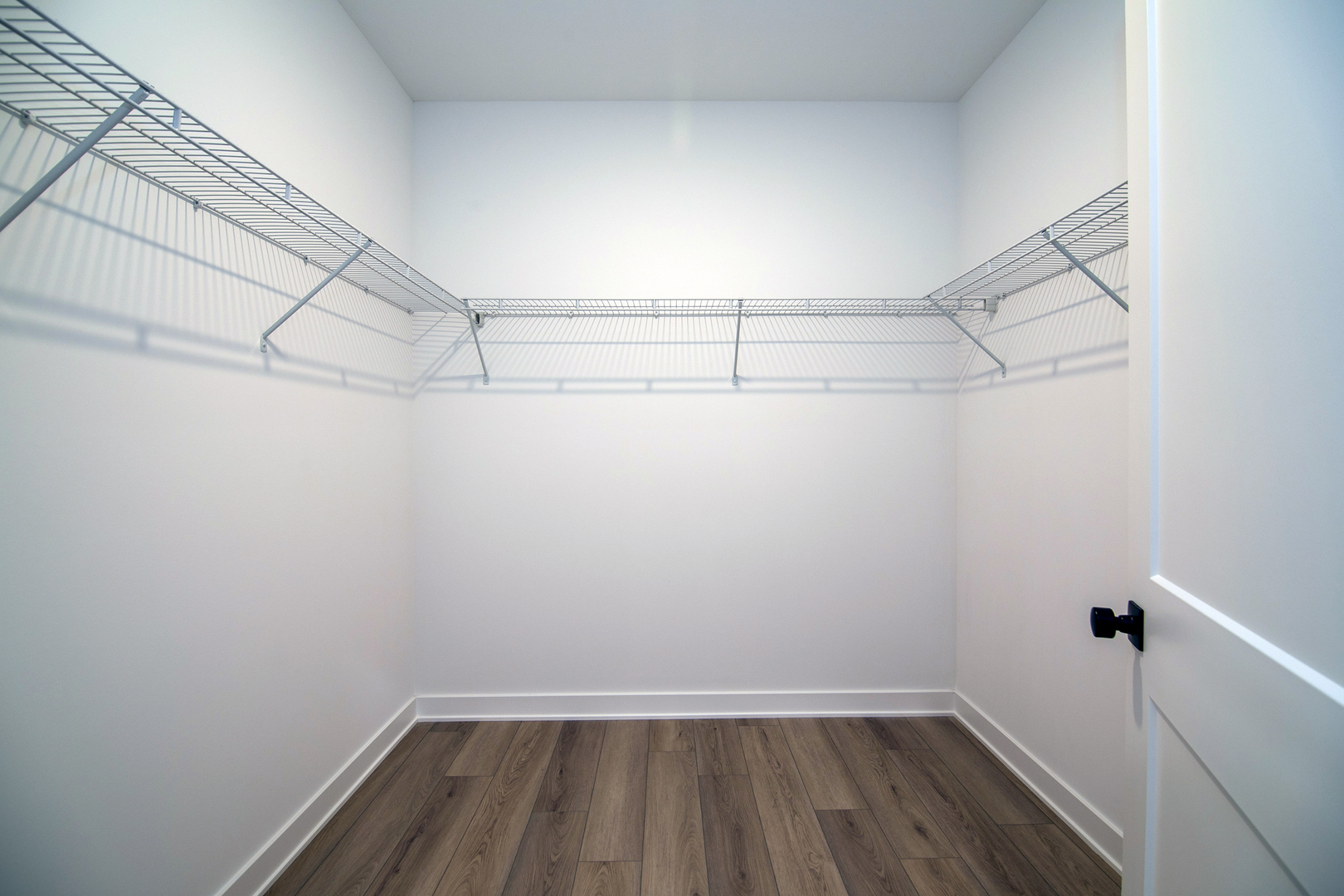 2037 Isabella Lane Minooka, IL 60447 - Photo 23 of 29 a view of a room with racks on the wall