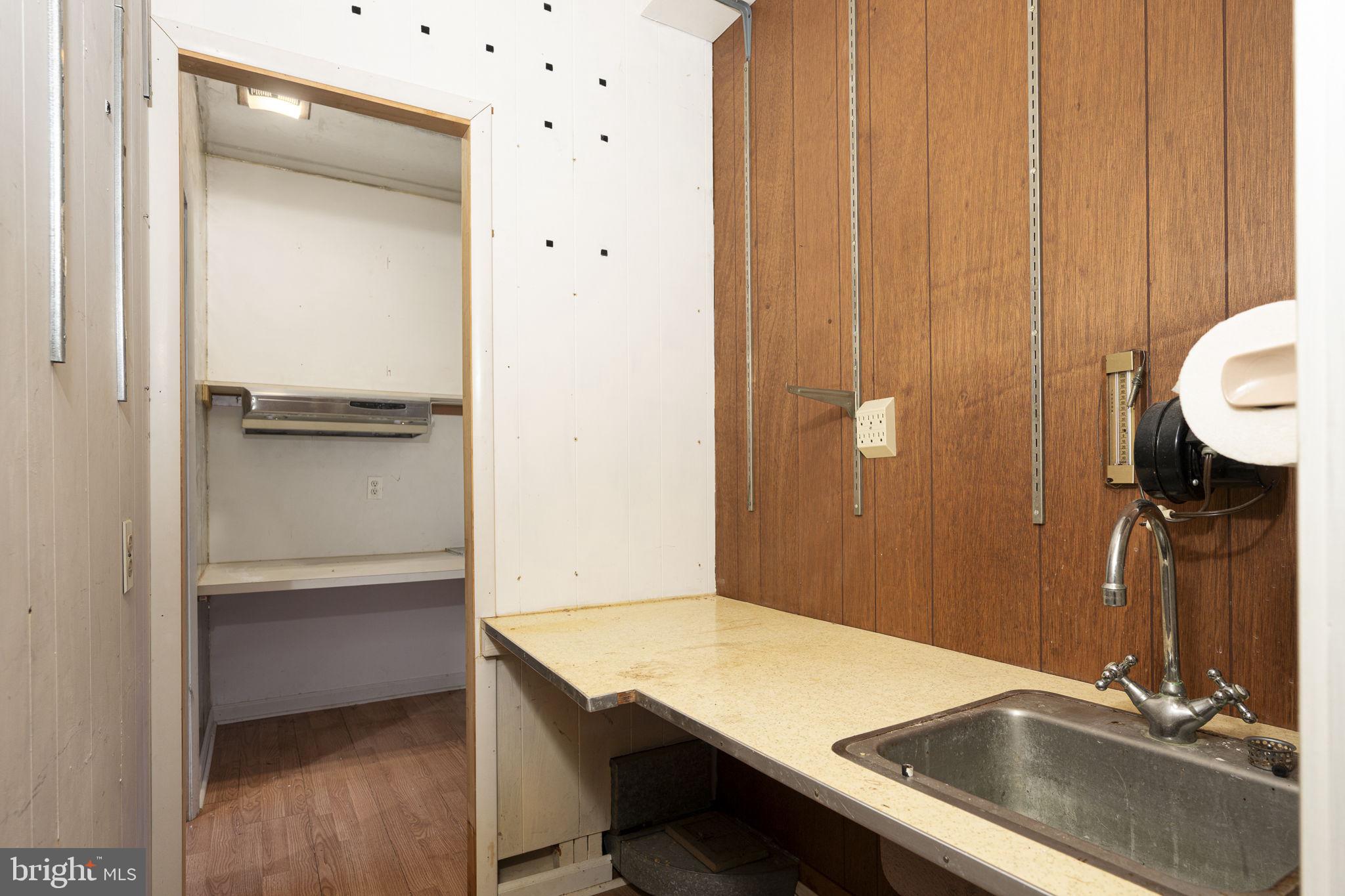 230 Jug Hollow Road Phoenixville, PA 19460 - Photo 12 of 60 a bathroom with a sink and a mirror