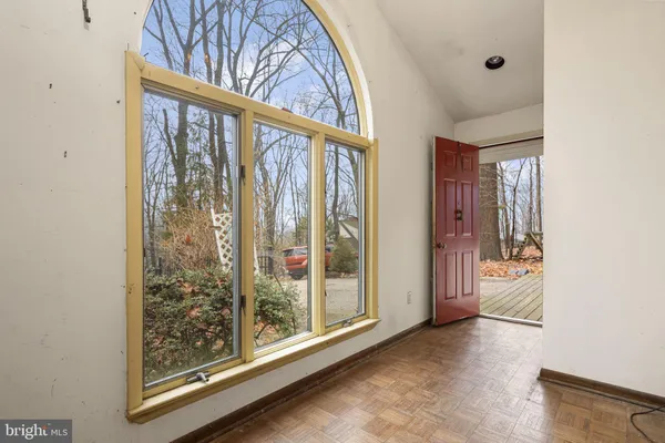 a view of a hallway with windows