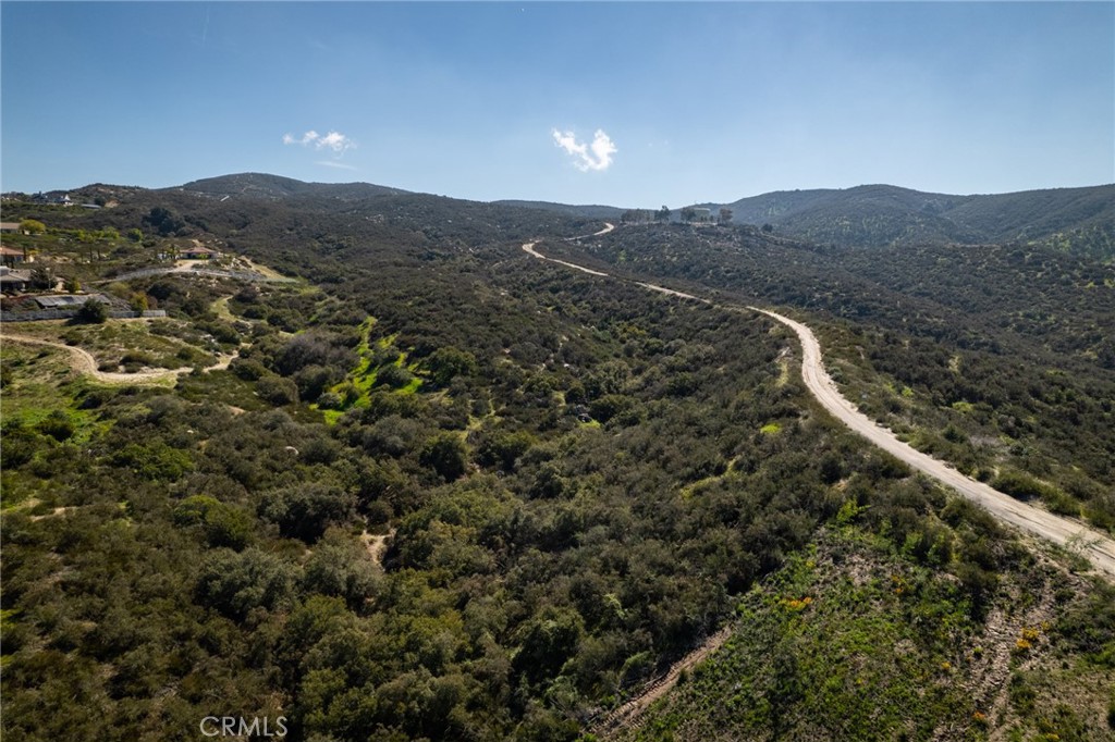 0 Esplendida Way Temecula, CA 92592 - Photo 15 of 24 a view of a mountain in the distance in a field
