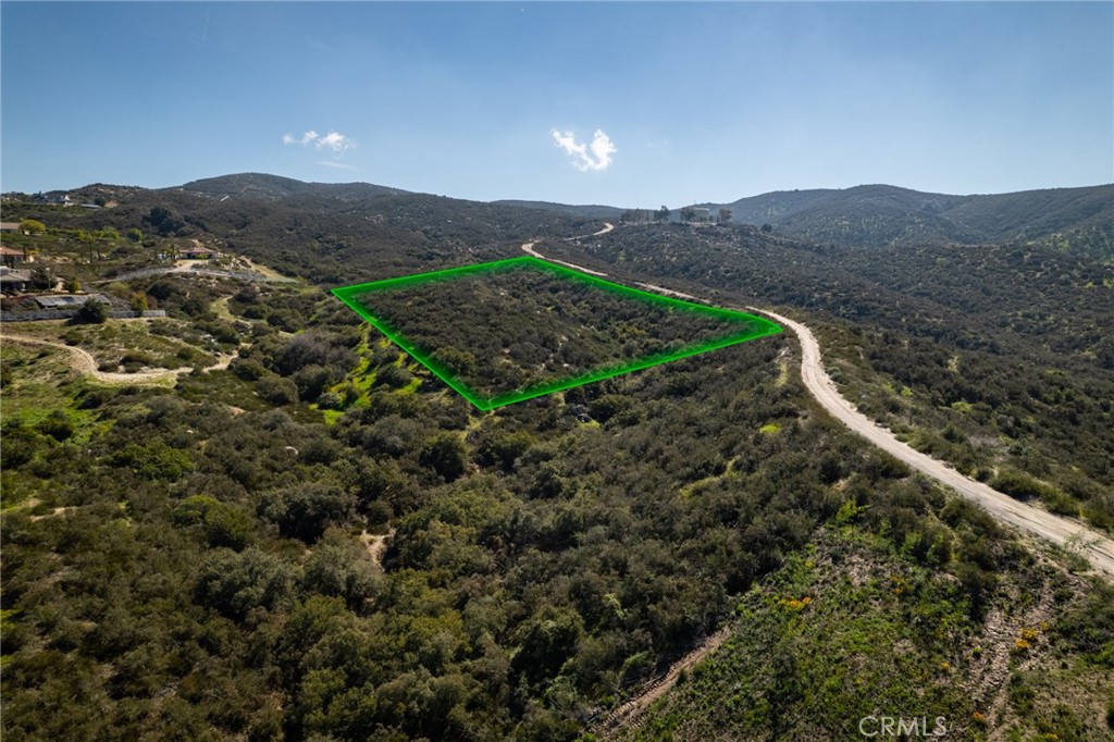 0 Esplendida Way Temecula, CA 92592 - Photo 16 of 24 a view of a mountain in the distance in a field