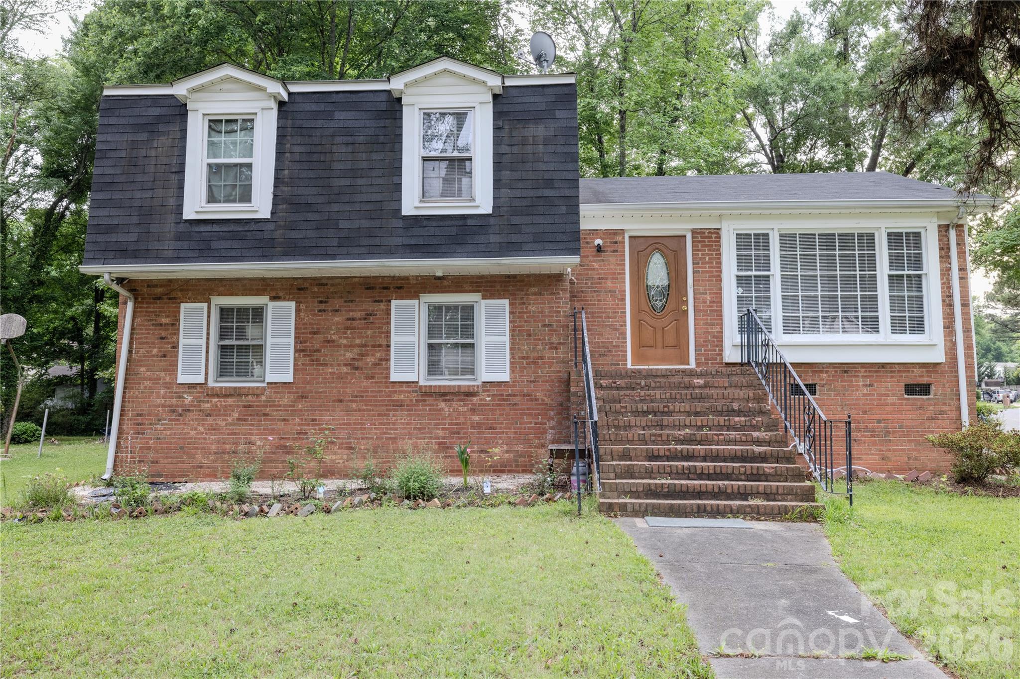 2545 Cedarwild Road Charlotte, NC 28212 - Photo 1 of 25 front view of a house with a yard