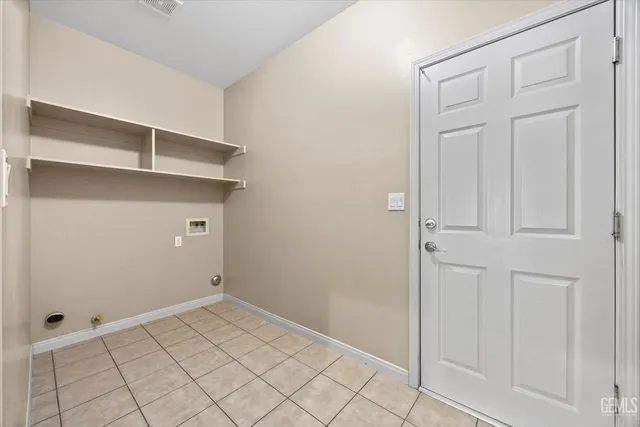 an empty room with a bench