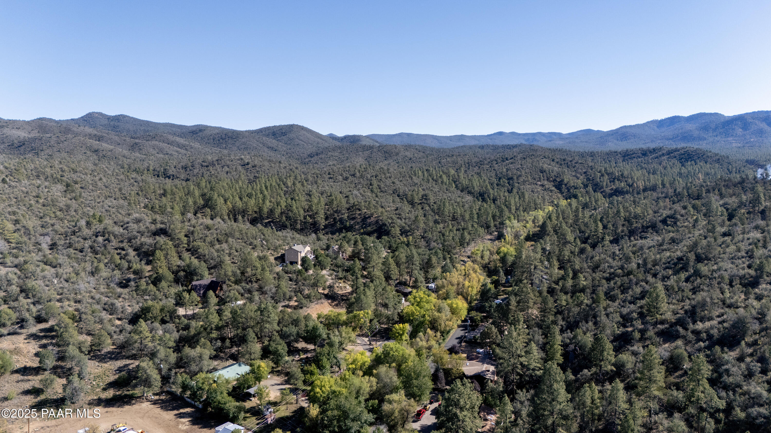 249 South Lynx Creek Road Prescott, AZ 86303 - Photo 118 of 124 a view of a lush green field with mountains in the background