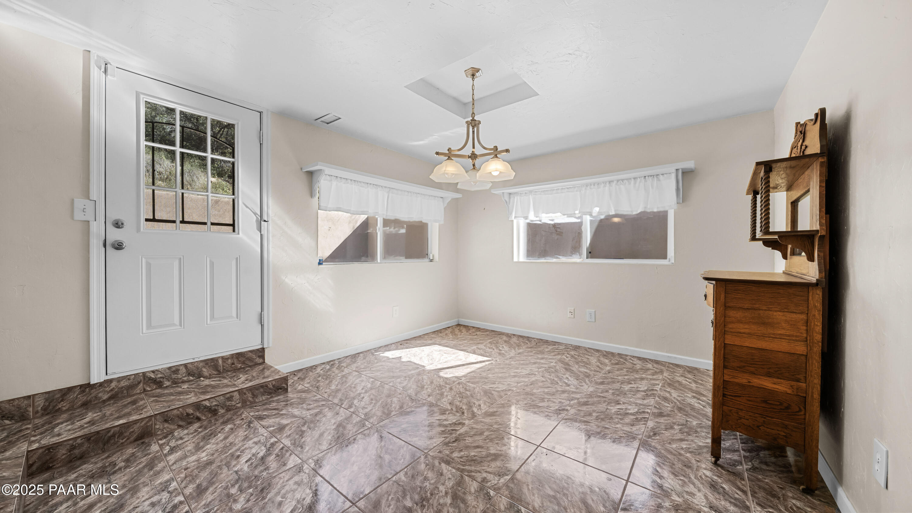 249 South Lynx Creek Road Prescott, AZ 86303 - Photo 19 of 124 a view of an empty room with a window