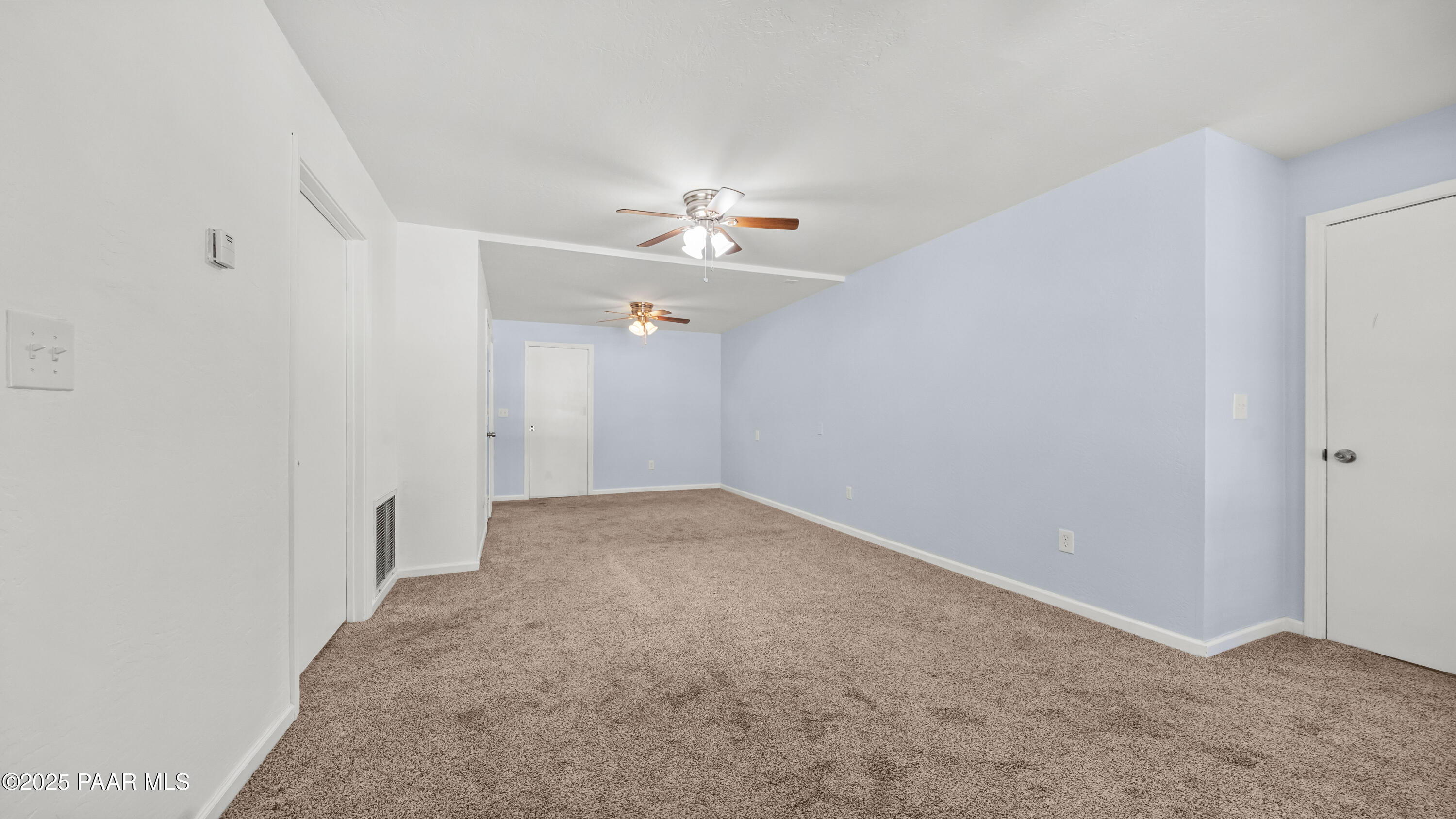 249 South Lynx Creek Road Prescott, AZ 86303 - Photo 25 of 124 a view of a big room with a ceiling fan and closet