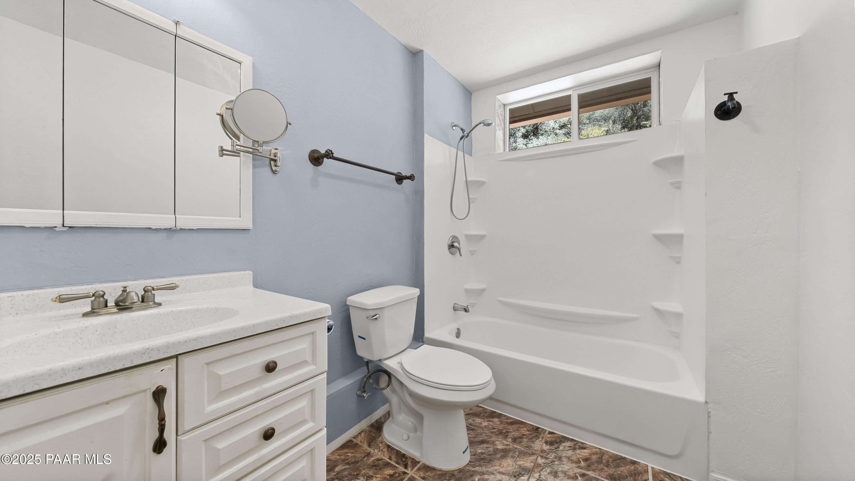 249 South Lynx Creek Road Prescott, AZ 86303 - Photo 27 of 124 a bathroom with a sink a toilet and shower