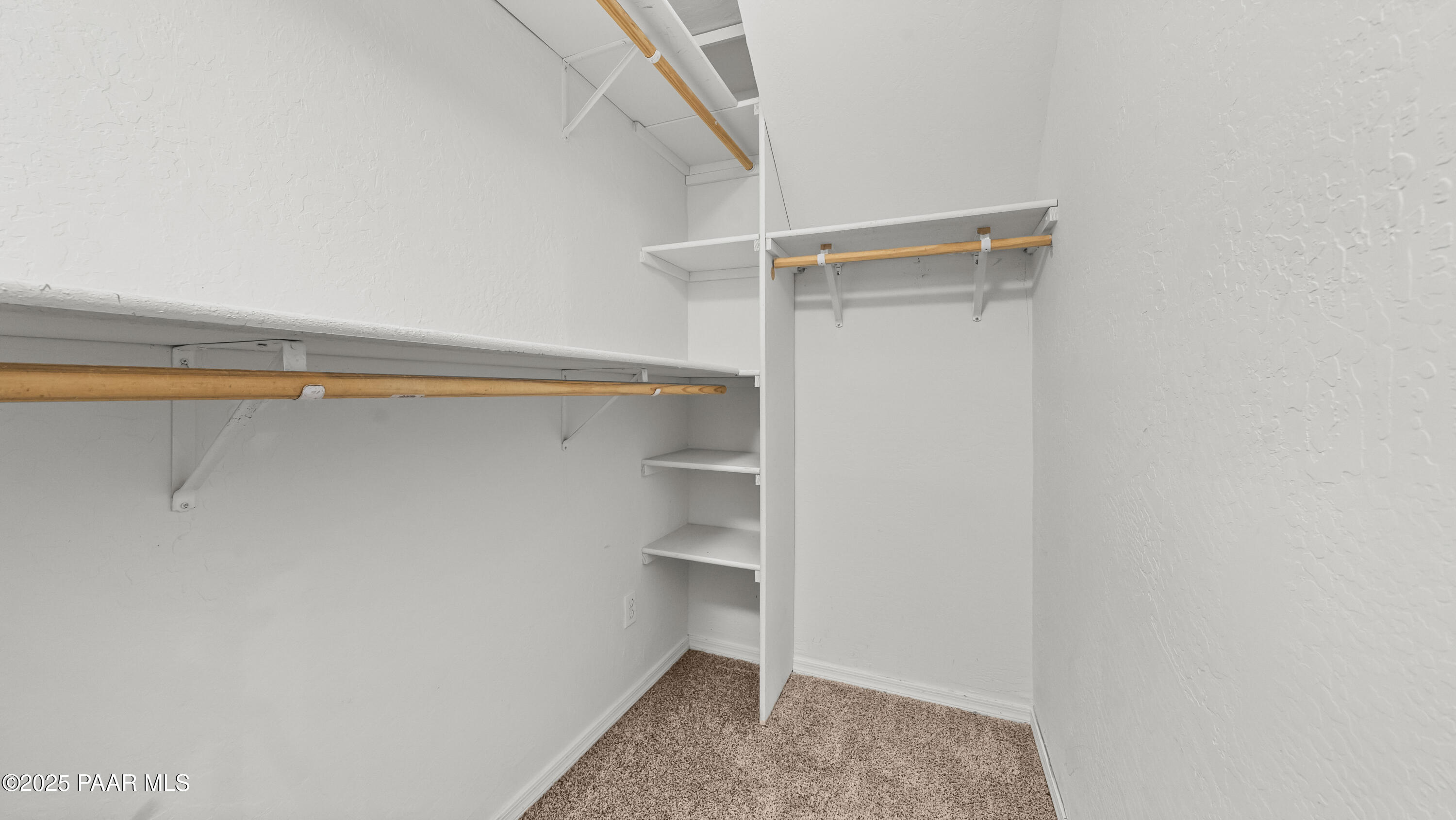 249 South Lynx Creek Road Prescott, AZ 86303 - Photo 29 of 124 a view of walk in closet with empty racks