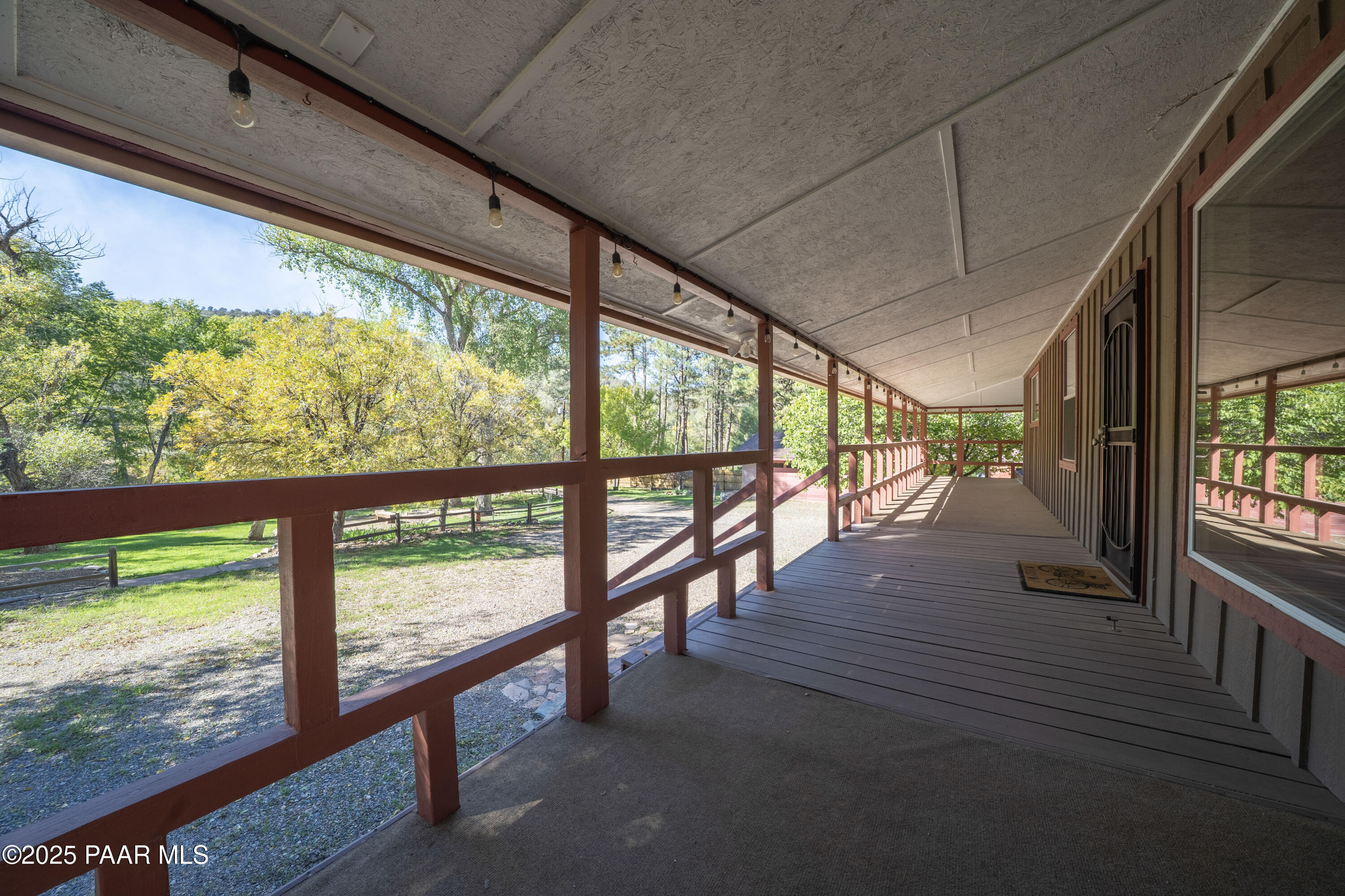 249 South Lynx Creek Road Prescott, AZ 86303 - Photo 5 of 124 a view of a porch with wooden floor and outdoor space