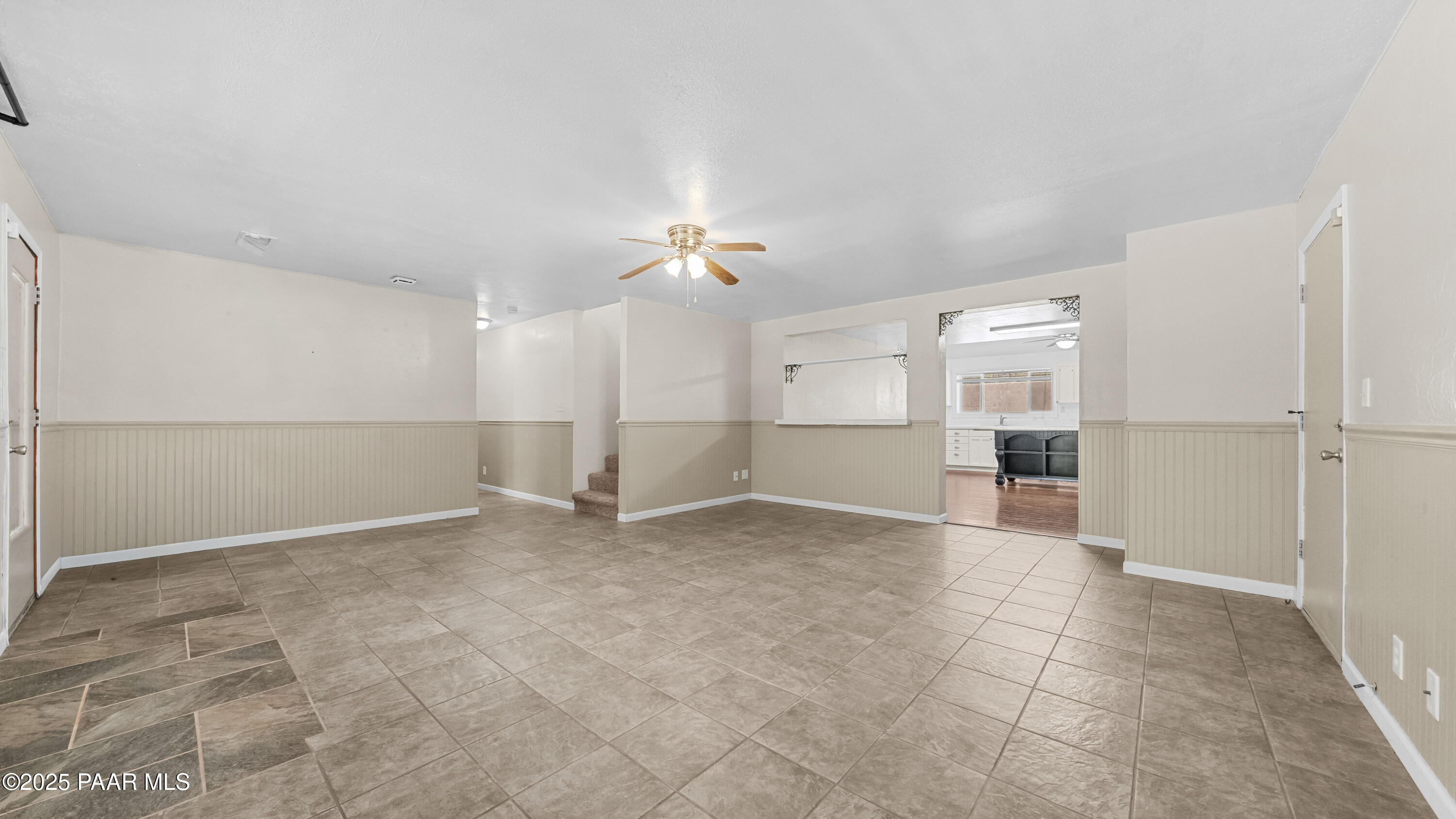 249 South Lynx Creek Road Prescott, AZ 86303 - Photo 6 of 124 a view of a kitchen with a refrigerator and a stove top oven