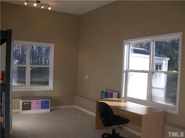 135 Ridge Road Butner, NC 27509 - Photo 13 of 25 Bonus room with lots of windows and light. great room with opportunity for a den, office or playroom.