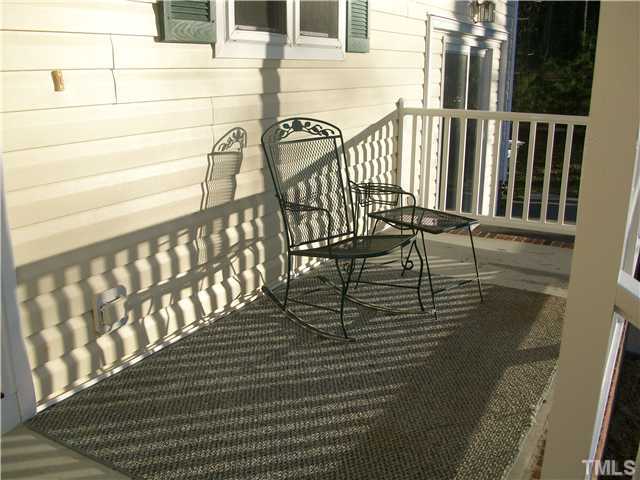 135 Ridge Road Butner, NC 27509 - Photo 3 of 25 Spacious porch for enjoying that favorite book or a cup of coffee!