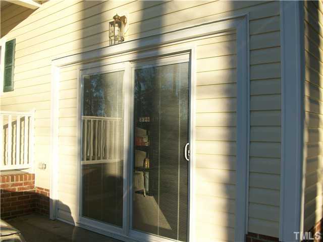 135 Ridge Road Butner, NC 27509 - Photo 23 of 25 sliding glass doors lead directly to the bonus room.