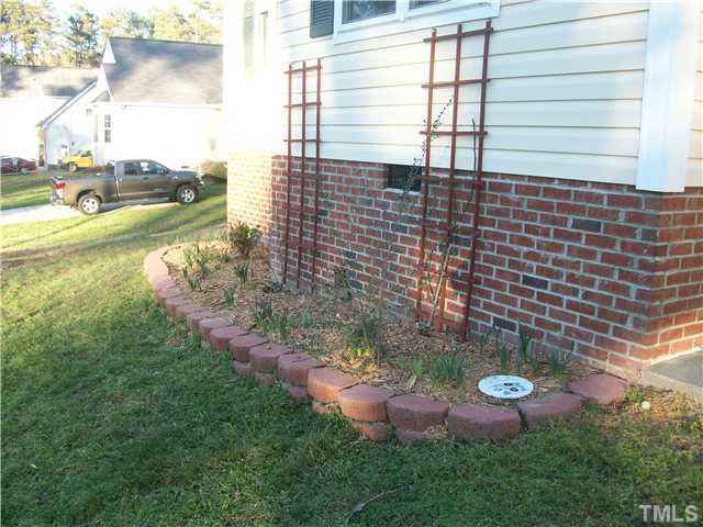 135 Ridge Road Butner, NC 27509 - Photo 24 of 25 raised flower beds look great during the spring and summer season. great for planting your favorites!