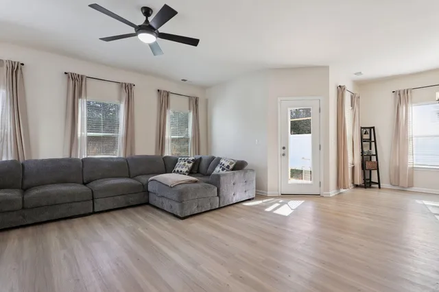a living room with furniture and a couch