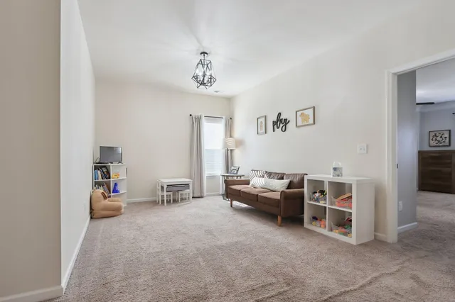 a bedroom with a bed and cabinets