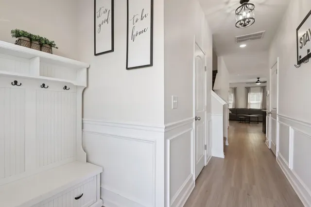 a view of a hallway view with staircase