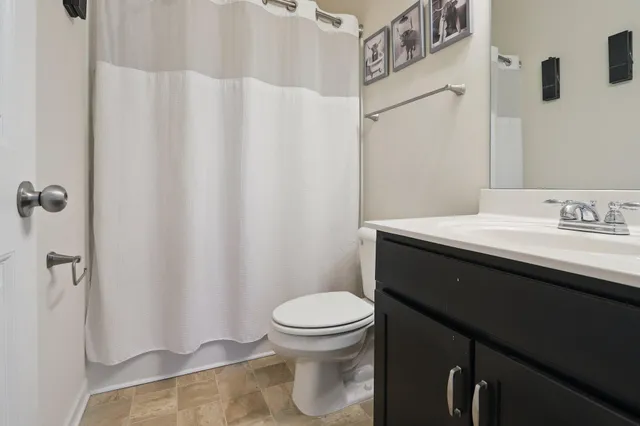 a bedroom with a bed and closet