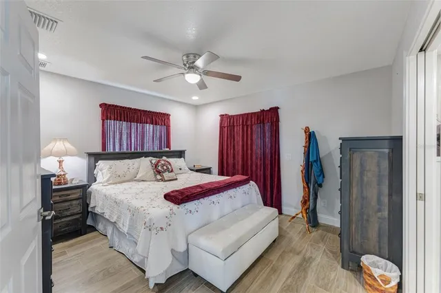 a bathroom with double vanity sink and a mirror