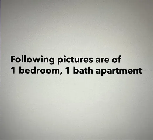 a view of walk in closet with clothes