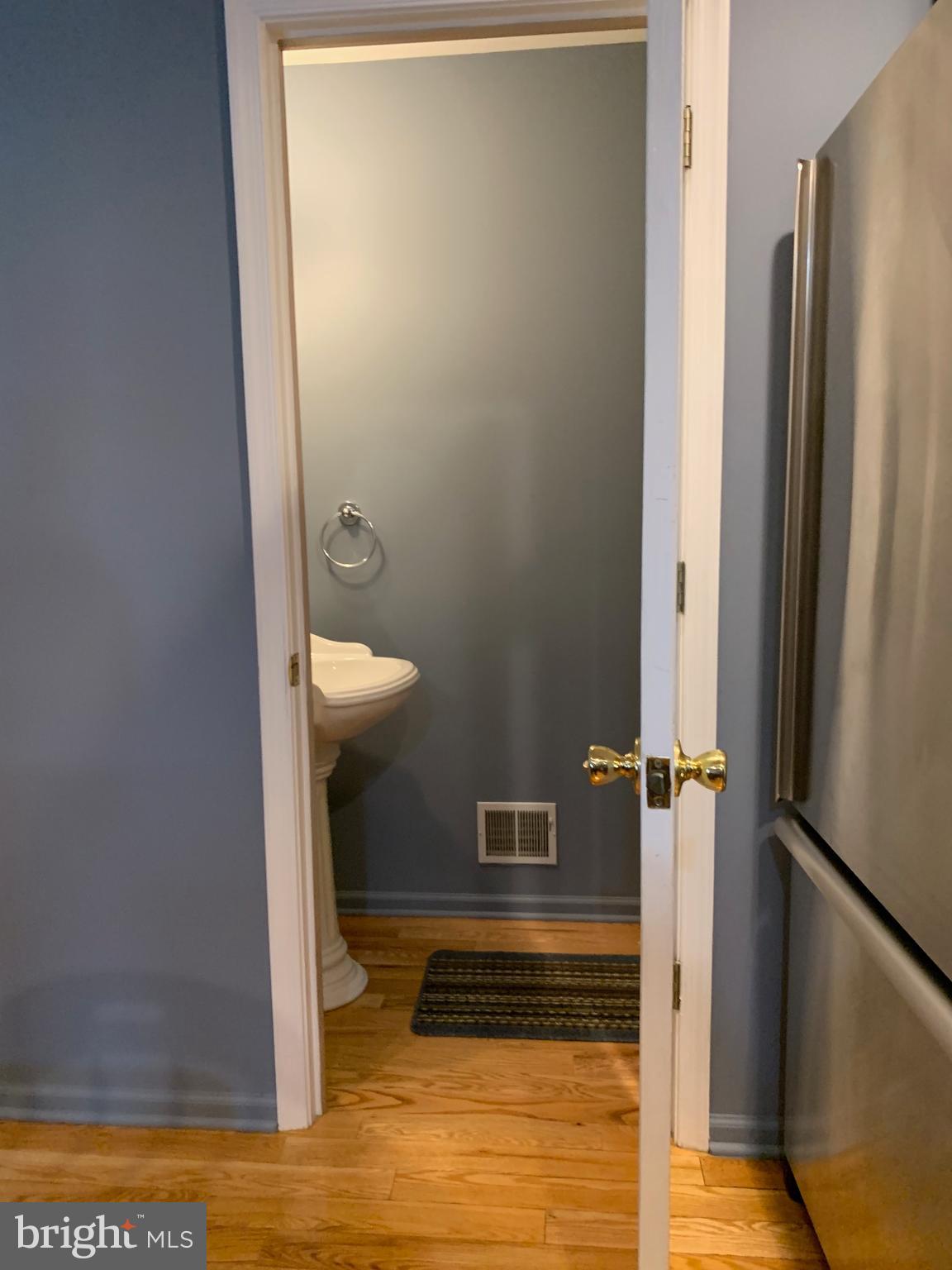 78 Baltusrol Drive Charles Town, WV 25414 - Photo 18 of 26 a bathroom with a sink and a mirror
